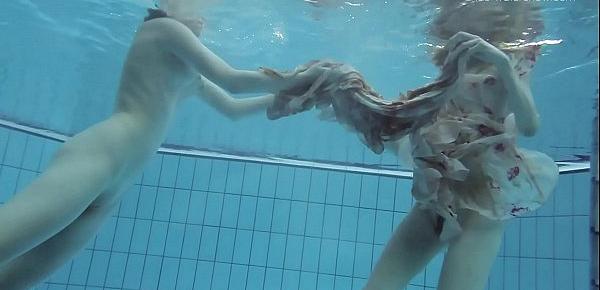  Two hot hairy beauties underwater